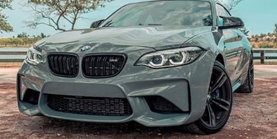 Bmw M2 wrapped in Avery SW Gloss Rock Grey vinyl