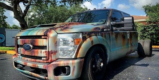 Ford Super Duty wrapped in custom printed 3M IJ180C-120 and 8520 vinyl