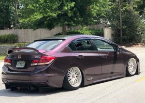 Honda Civic wrapped in Gloss Black Rose vinyl