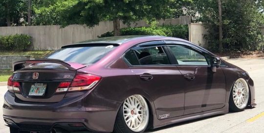 Honda Civic wrapped in Gloss Black Rose vinyl