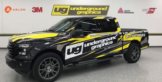 Commercial Car wrapped in custom printed Arlon SLX and 3210 laminate