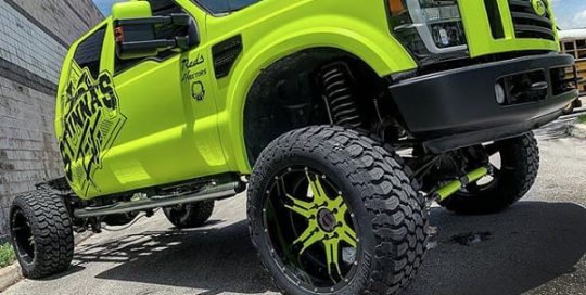 Ford F250 wrapped in 3M 1080 Satin Neon Fluorescent Yellow & Matte Black vinyls