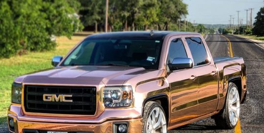 GMC wrapped in Avery SW Rose Gold Chrome vinyl