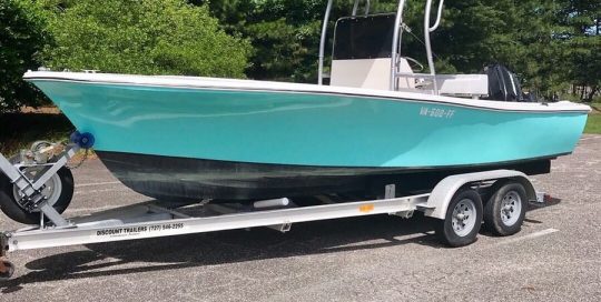 Boat wrapped in Gloss Mint Blue vinyl
