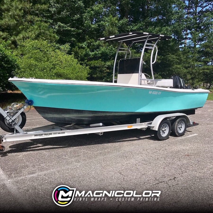 Boat wrapped in Gloss Mint Blue vinyl