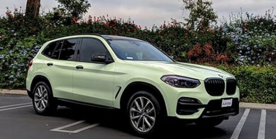 Bmw X3 wrapped in Avery SW Gloss Light Pistachio vinyl