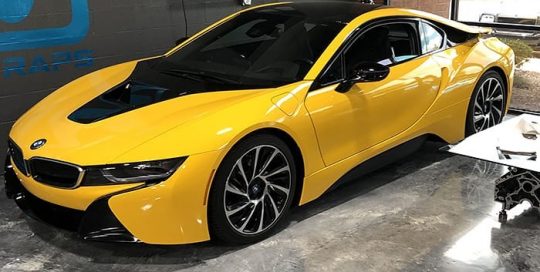 Bmw I8 wrapped in Avery SW Gloss Dark Yellow and Gloss Black vinyls