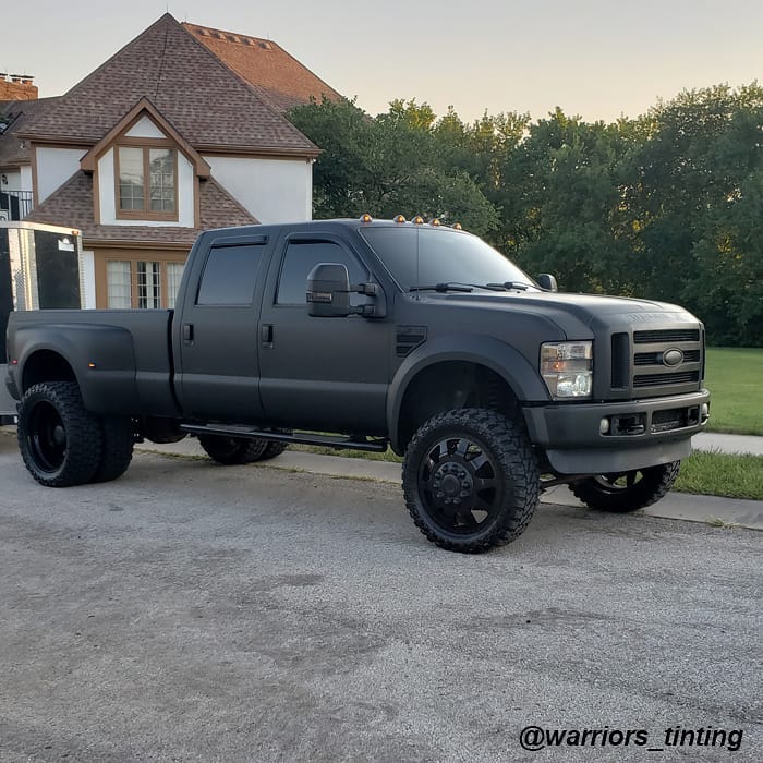 Ford F450 wrapped in 3M 1080 Matte Deep Black vinyl