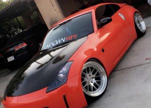 Nissan 350z wrapped in Gloss Racing Red vinyl