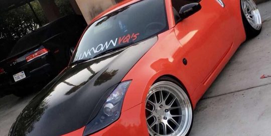 Nissan 350z wrapped in Gloss Racing Red vinyl