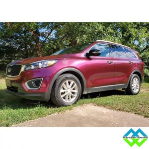 Kia Sorento wrapped in Avery SW Gloss Fun Purple vinyl