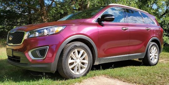 Kia Sorento wrapped in Avery SW Gloss Fun Purple vinyl