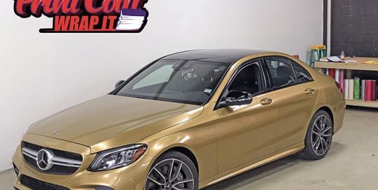 Mercedes Benz wrapped in 3M 1080 Gloss Gold Metallic vinyl