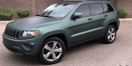 Jeep wrapped in 3M 1080 Matte Pine Green Metallic and Matte Black vinyls