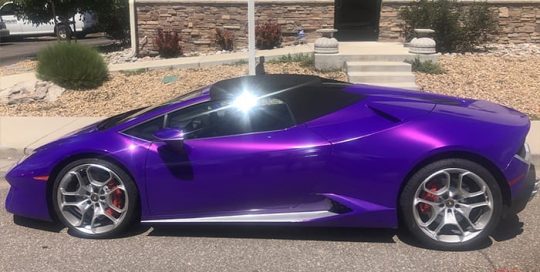 Lamborghini Huracan wrapped in 3M 1080 Gloss Plum Explosion vinyl