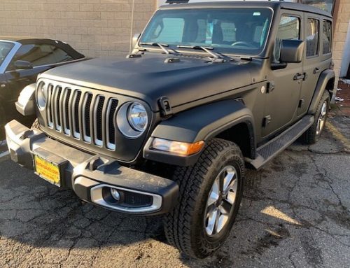 Jeep Rubicon wrapped in Matte Black vinyl