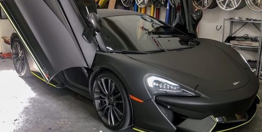 Maclaren 570s wrapped in Matte Black vinyl