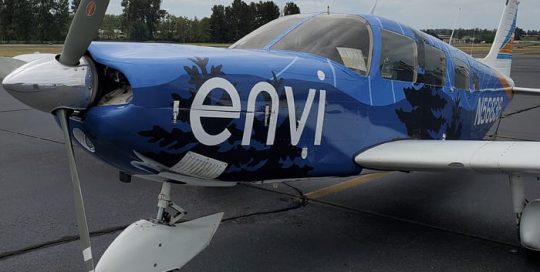 Commercial Plane wrapped in custom printed Avery 1105 & 1360z Gloss laminate vinyls