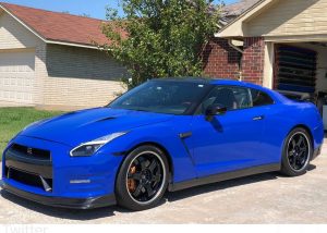Nissan GTR wrapped in Gloss Dark Blue vinyl