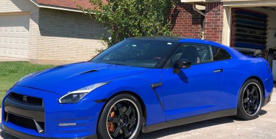 Nissan GTR wrapped in Gloss Dark Blue vinyl