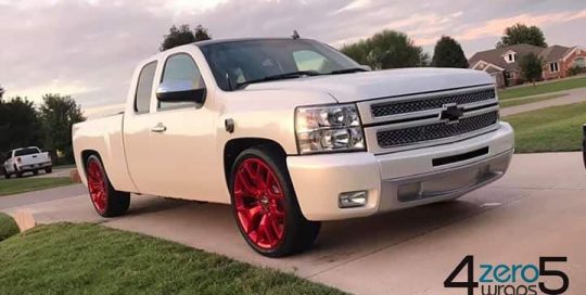 Chevrolet Silverado wrapped in Avery SW Gloss Pearl White vinyl
