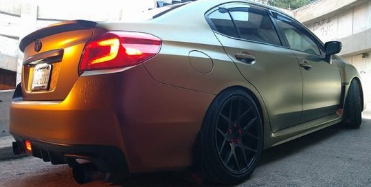 Subaru Wrx wrapped in Avery ColorFlow Satin Rising Sun Red/Gold shade shifting vinyl