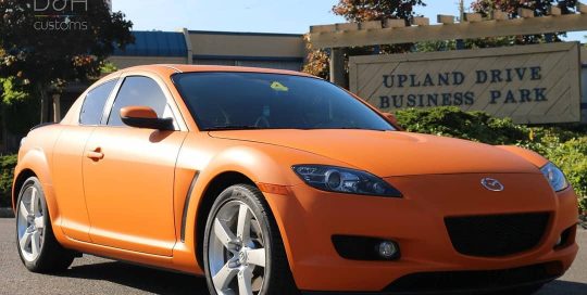 Mazda RX8 wrapped in Avery SW Matte Orange vinyl