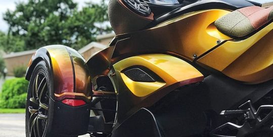 CANAM wrapped in Avery ColorFlow Gloss Rising Sun Red/Gold shade shifting vinyl