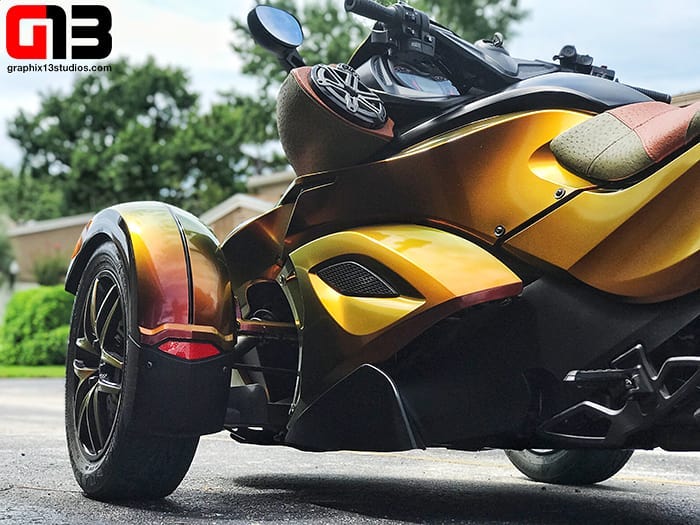 CANAM wrapped in Avery ColorFlow Gloss Rising Sun Red/Gold shade shifting vinyl