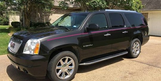 GMC Denali wrapped in Avery SW Gloss Black Metallic vinyl