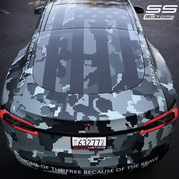 Tesla wrapped in custom printed Avery 1105 and 1370z Luster Overlaminate