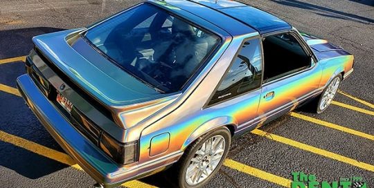 Ford Mustang wrapped in 3M Gloss Flip Psychedelic vinyl