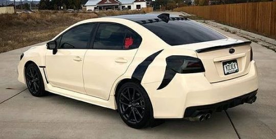 Subaru WRX wrapped in 3M 1080 Gloss Light Ivory and Gloss Black vinyls