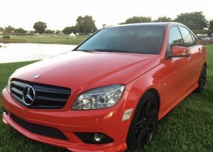Mercedes Benz wrapped in Gloss Carmine Red vinyl