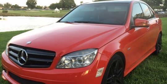 Mercedes Benz wrapped in Gloss Carmine Red vinyl