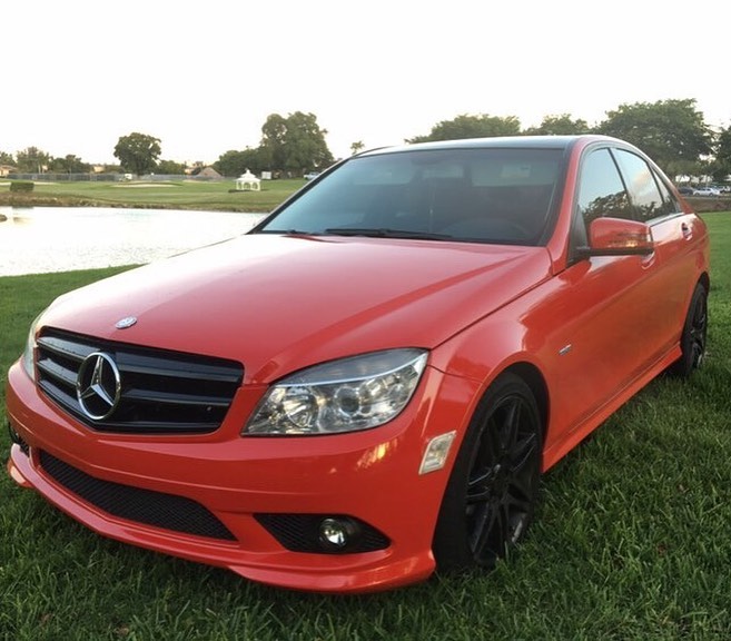 Mercedes Benz wrapped in Gloss Carmine Red vinyl