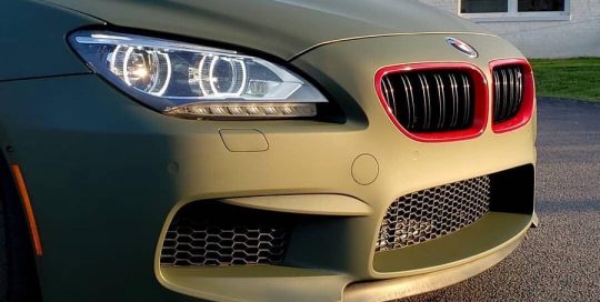 Bmw 350i wrapped in Matte Military Green vinyl