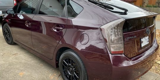 Toyota Prius wrapped in Gloss Black Rose vinyl