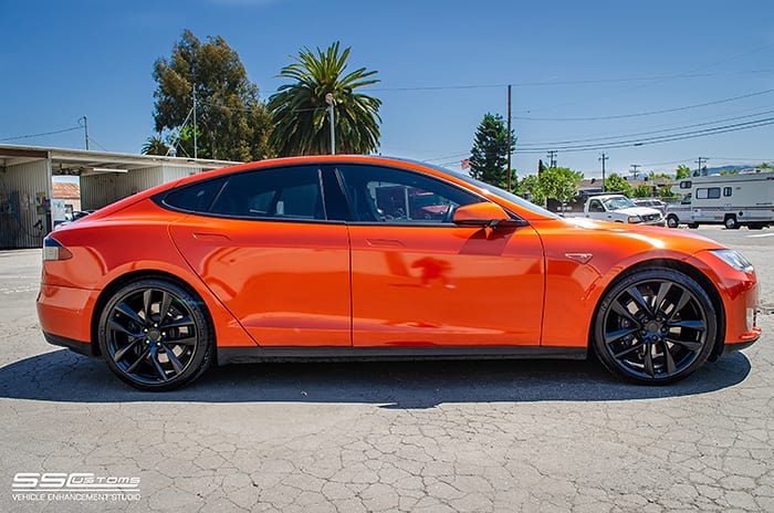Tesla wrapped in 3M Gloss Fiery Orange vinyl