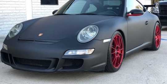 Porsche wrapped in Matte Black vinyl