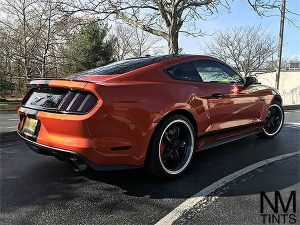 Ford Mustang wrapped in 3M 1080 Gloss Fiery Orange vinyl