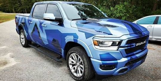 Dodge Ram wrapped in Avery SW Matte Brilliant Blue, Matte Powder Blue Metallic, and Gloss Dark Blue Metallic vinyls