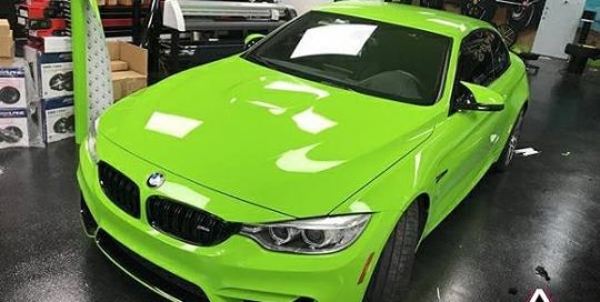 Bmw M4 wrapped in 3M 2080 Gloss Light Green vinyl