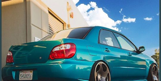 Subaru WRX wrapped in 1080 Atomic Teal vinyl