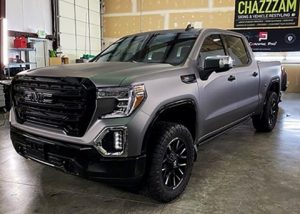 GMC Wrapped in 3M Matte Dark Gray & Gloss Black Vinyl
