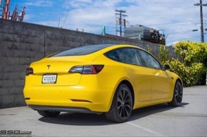 Tesla Model3 Wrapped in Avery Dennison SW Satin Yellow Vinyl