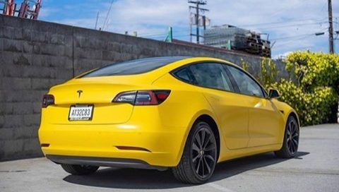 Tesla Model3 Wrapped in Avery Dennison SW Satin Yellow Vinyl