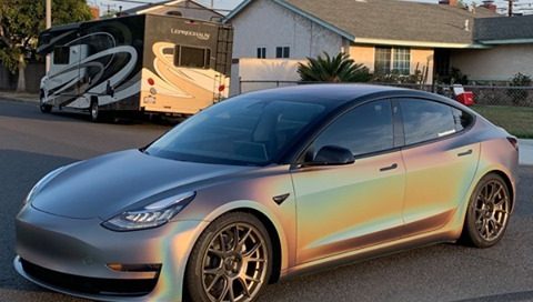Tesla Wrapped in 3M Satin Flip Psychedelic Vinyl