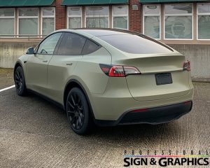 Tesla Wrapped in Avery Dennison Satin Khaki Green Vinyl