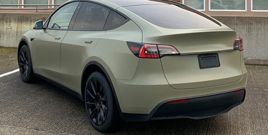 Tesla Wrapped in Avery Dennison Satin Khaki Green Vinyl
